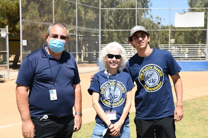 posing at the baseball court